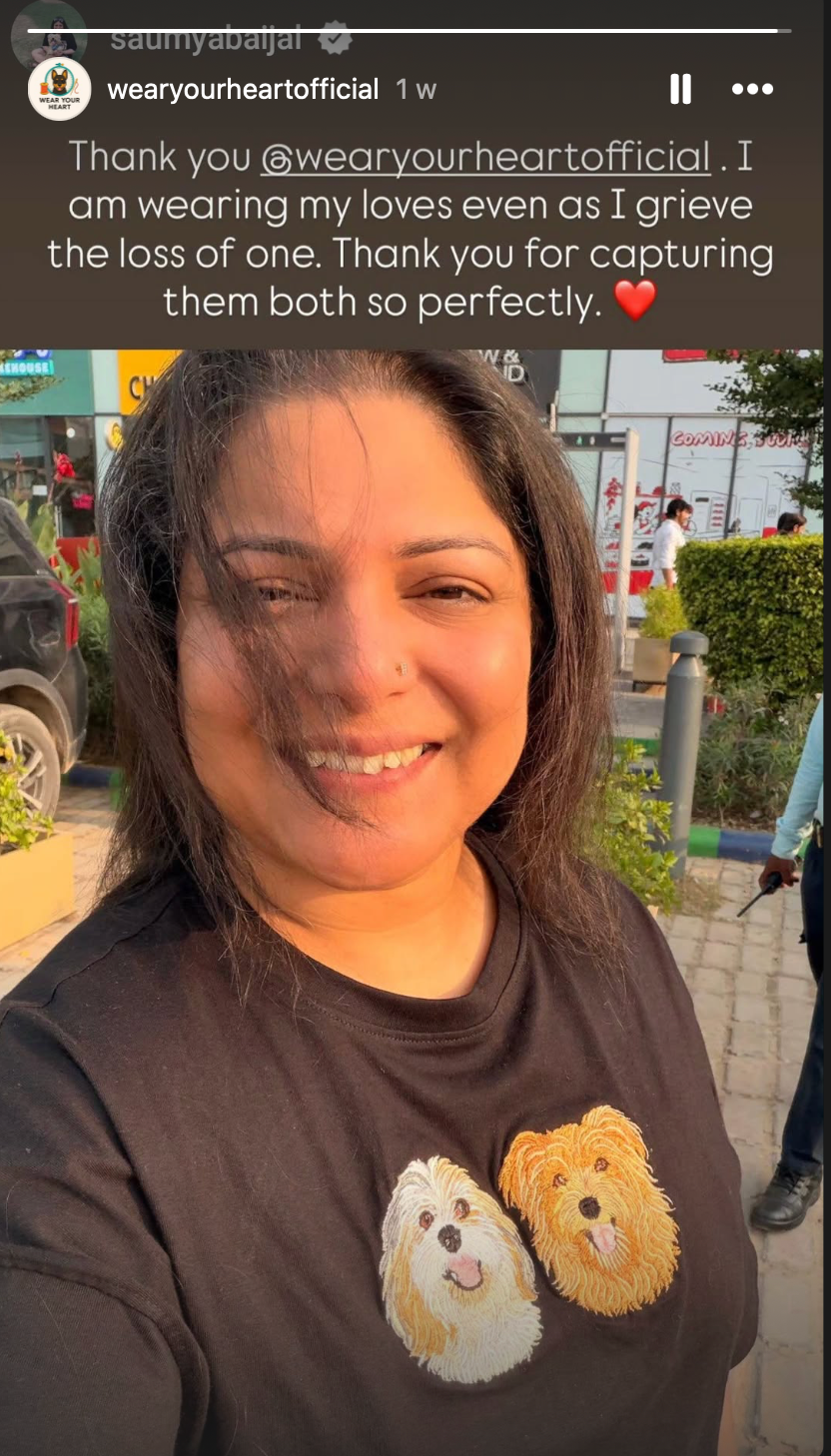 Customer wearing memorial embroidery of two pets